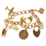 A 9CT GOLD CHARM BRACELET WITH SEVEN GOLD CHARMS, IN 9CT GOLD, MARKED 9CT OR UNMARKED, 27.5G++