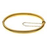 A GOLD BANGLE, MARKED 15CT, 7.5G++LIGHT WEAR CONSISTENT WITH AGE