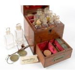 A VICTORIAN MAHOGANY DOMESTIC MEDICINE CHEST WITH FITTED INTERIOR CONTAINING CONTEMPORARY GLASS