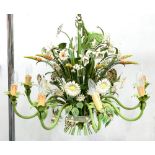 A NATURALISTIC PAINTED WROUGHT METAL EIGHT LIGHT CHANDELIER IN THE FORM OF A BUNCH OF FLOWERS,
