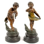 A PAIR OF FRENCH PATINATED SPELTER STATUETTES OF A BOY AND GIRL, ON BRONZED SOCLE, 23CM H, C1900