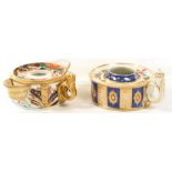 TWO DERBY HAND INKWELLS, ONE DECORATED IN A JAPAN PATTERN, THE OTHER WITH BLUE AND GILT PANELLED