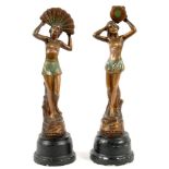 A PAIR OF ART DECO GILT AND PATINATED SPELTER STATUETTES OF BIKINI DANCERS, WITH FAN OR