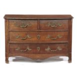 A LOUIS XVI PROVINCIAL OAK COMMODE, C1780 with chinoiserie brass handles and escutcheons, 78cm h; 57