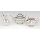 A VICTORIAN THREE PIECE GLOBULAR SILVER TEA SERVICE   with beaded rims and engraved with