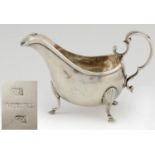 CORK SILVER.  AN IRISH PROVINCIAL SAUCE BOAT, C1770-99  crested, 15cm l, by John Nicholson of