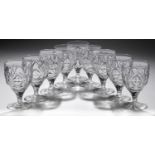 A SET OF NINE ENGLISH DIAMOND CUT GLASS GOBLETS, SECOND QUARTER 20TH C  on faceted stem, star cut