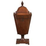 A GEORGE III MAHOGANY CUTLERY URN, C1800  with fitted interior and rising lid, turned finial, on
