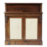 A GEORGE IV ROSEWOOD CHIFFONIER, C1825  with carved acanthus corbels, 116cm h; 35 x 107cm Good