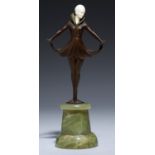 AN ART DECO BRONZE AND IVORY STATUETTE, C1930 turned onyx plinth, 23cm h Hairline cracks in ivory