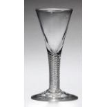 AN ENGLISH WINE GLASS, C1750  the drawn trumpet bowl on multi series air twist stem, conical foot,