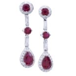 A PAIR OF RUBY AND DIAMOND EARRINGS with pear shaped drop, in white gold, 2.6cm, marked 750, 4.3g