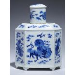 AN HEXAGONAL CHINESE BLUE AND WHITE TEA CADDY AND COVER, QING DYNASTY OR  LATER  painted with dogs
