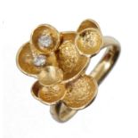 A DIAMOND AND 18CT GOLD FLOWER RING BY KUTCHINSKY  mark of Kutchinsky Ltd, London 1975, 6.5g, size