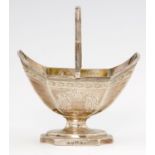A GEORGE III ENGRAVED SILVER SUGAR BASKET  with reeded handle and rim, 14cm h, by Thomas Wallis