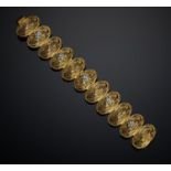 A DIAMOND AND 18CT GOLD BRACELET BY BOODLES  20cm l, import marked London 1972, 84.5g Good condition