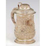 A GEORGE III SILVER TANKARD  later chased and engraved with armorials, 19cm h, maker IS in script,