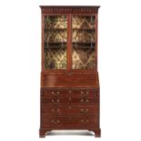 A VICTORIAN MAHOGANY BUREAU BOOKCASE, LATE 19TH C  the cabinet with pear-drop frieze fitted with