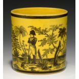 A BRITISH BRIGHT YELLOW GLAZED EARTHENWARE MUG, EARLY 19TH C transfer printed in black with Napoleon
