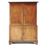 A GEORGE III MAHOGANY LINEN PRESS, C1820  with Greek key cornice, the upper part enclosed by