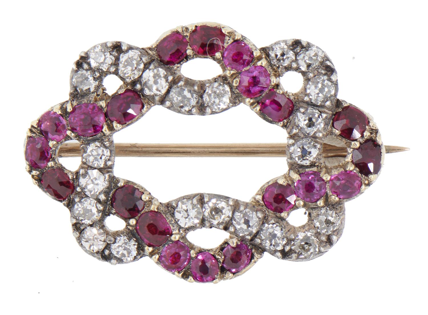 A RUBY AND DIAMOND BROOCH, EARLY 19TH C of fine ribbon design, 2.6cm, 4.8g, later gold pin