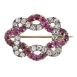 A RUBY AND DIAMOND BROOCH, EARLY 19TH C of fine ribbon design, 2.6cm, 4.8g, later gold pin