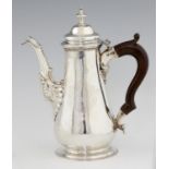 A GEORGE II SILVER COFFEE POT OF UNUSUAL SIZE crested, 30cm h, maker TW in script, probably Thomas