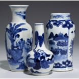 THREE CHINESE BLUE AND WHITE VASES, QING DYNASTY, 19TH C painted with groups of ladies, one with a