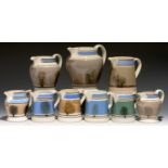 NINE BRISTOL AND EDGE, MALKIN & CO MOCHA WARE JUGS, LATE 19TH AND EARLY 20TH C  half gallon-pint,