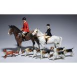 A BESWICK FOX HUNTERS SET, 20TH C comprising two equestrian figures, fox and hounds, man 25cm h,
