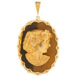A DIAMOND, TIGER'S EYE AND 9CT GOLD PENDANT   designed as the head of a young woman, 5.3cm excluding