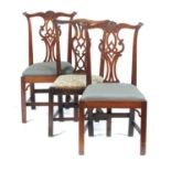 A PAIR OF GEORGE III MAHOGANY DINING CHAIRS, C1780 with interlaced splat, 95cm h and a George III