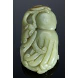 A CHINESE GREEN JADE CARVING OF A 'BUDDHA'S HAND' CITRON, POSSIBLY 19TH C  the citron borne on a