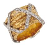 A DIAMOND AND TWO COLOUR GOLD BAND BY KUTCHINSKY mark of Kutchinsky Ltd, London 1971, 20.5g, size