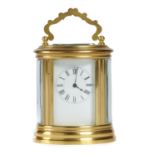 A FRENCH GILT BRASS MINIATURE OVAL CARRIAGE CLOCK, HENRI JACOT  NO 8076, LATE 19TH C with enamel