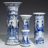 THREE CHINESE BLUE AND WHITE VASES, QING DYNASTY, 19TH C of beaker or cylindrical shape, painted