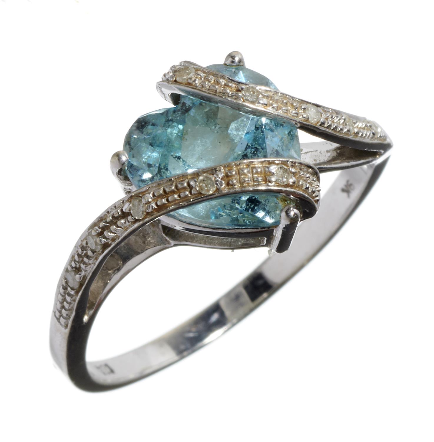 A DIAMOND AND HEART SHAPED BLUE TOPAZ RING in white gold, marked 9k, 2.8g, size P½ Good condition