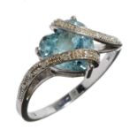 A DIAMOND AND HEART SHAPED BLUE TOPAZ RING in white gold, marked 9k, 2.8g, size P½ Good condition