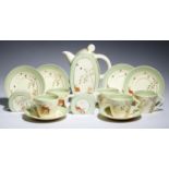 CLARICE CLIFF. A BONJOUR WISHING WELL PATTERN COFFEE SET, 1937 coffee pot and cover 18cm h,