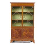 A FINE MAHOGANY, SATINWOOD AND PENWORK CABINET IN THE MANNER OF JAMES HICKS OF DUBLIN, C1910  with