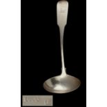 AN IRISH GEORGE III SILVER SAUCE LADLE  Fiddle pattern, crested, by Terry & Williams of Cork, Dublin