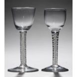 AN ENGLISH WINE GLASS, C1770  the lipped ovoid bowl on double series opaque twist stem and stepped