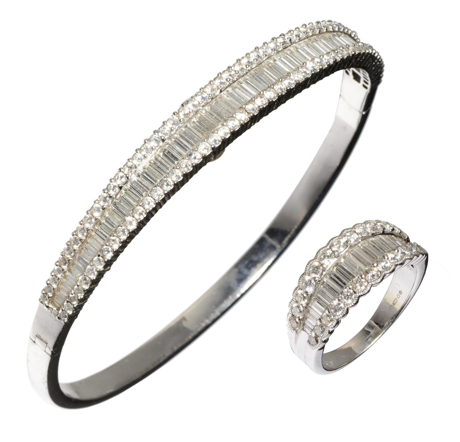 A DIAMOND BANGLE AND RING EN SUITE  with three rows of baguette and brilliant cut diamonds, in