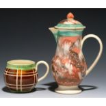 AN EARLY COMBED SLIP BALUSTER JUG AND COVER, C1790 with reeded, green glazed border, 14cm h and an