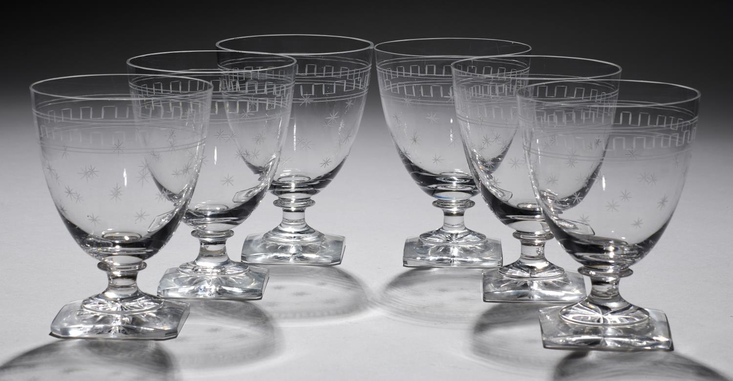 A SET OF SIX ENGLISH GLASS RUMMERS, EARLY 20TH C  the bowl engraved with stars beneath Greek key