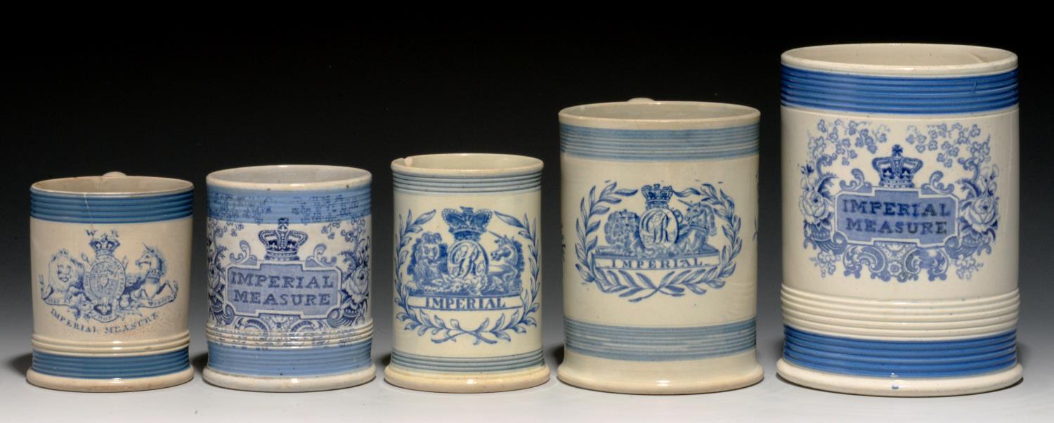 FIVE CYLINDRICAL BLUE PRINTED EARTHENWARE AND PEARLWARE IMPERIAL MEASURES, C1824-1840 quart, pint