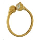 A UNIVERSAL GOLD LADY'S BANGLE WATCH, C MID 20TH C  maker's marks and 750 Good condition