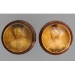 A PAIR OF ENGLISH ROYAL COMMEMORATIVE GLASS PINCHBECK PAPERWEIGHTS, C1840  with matt gilt relief