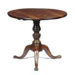 A GEORGE III MAHOGANY TRIPOD TABLE, C1770 the associated figured top on baluster pillar with