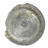 A RARE ROMANO BRITISH PEWTER DISH, C 4TH CENTURY AD  38cm diam In excavated condition, locally